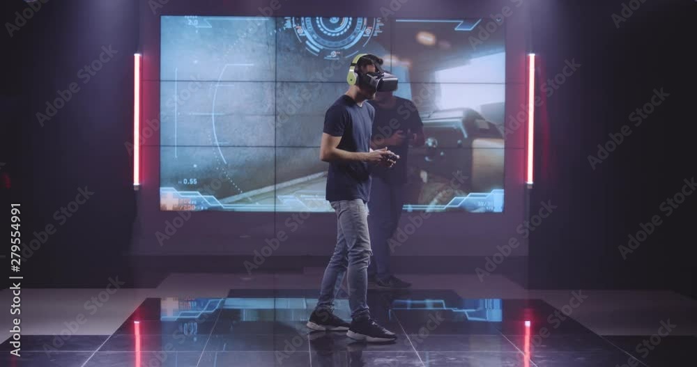 Young men playing VR game