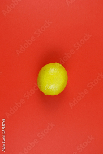 citrus on a red background upside