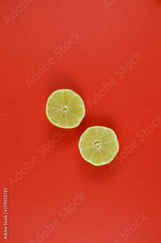 citrus on a red background upside