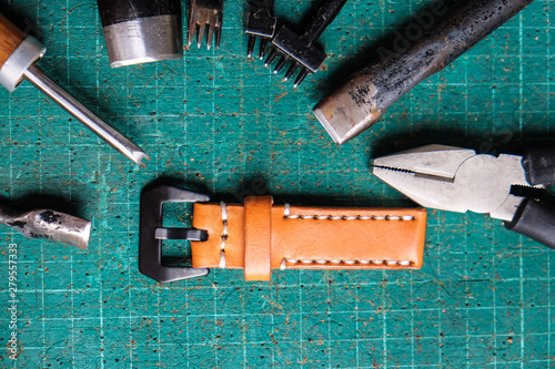 Handnade leather watch strap with tool photo