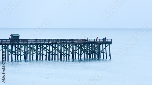 Fishing on Ocean Pier at Sunset