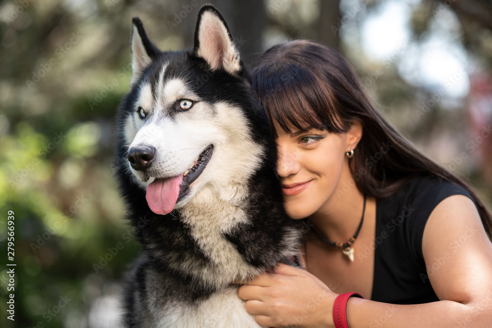Best friendship between a woman and her husky dog, great day outside Best friendship between a woman and her husky dog, great day outside