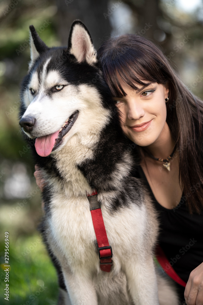 Best friendship between a woman and her husky dog, great day outside Best friendship between a woman and her husky dog, great day outside