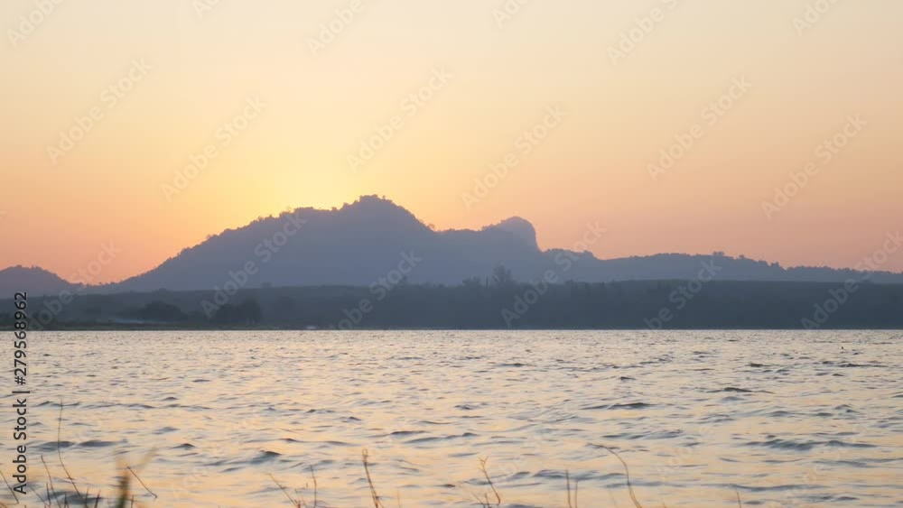 Evening scene in national park , Landscape view of pond and mountain in Thailand