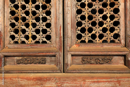 Chinese traditional wood-based carved window lattice photo