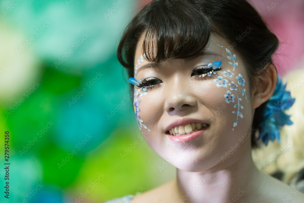 Chiba, Japan, 02/18/2019 , Japanese young model with facepaint during a photo shoot. Chiba, Japan, 02/18/2019 , Japanese young model with facepaint during a photo shoot.