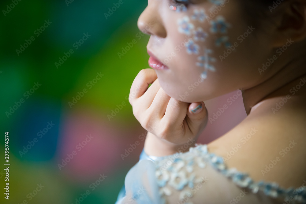 Chiba, Japan, 02/18/2019 , Japanese young model with facepaint during a photo shoot.