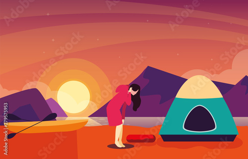 woman with camping tent on the river shore