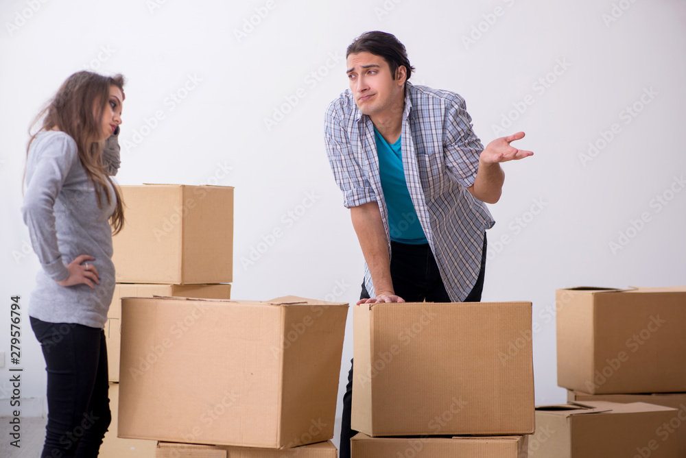 Young pair moving to new flat Young pair moving to new flat