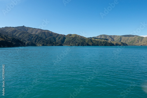 Beautifil rugged costal scenery sailing across the ocean in New Zealand