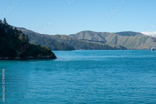 Beautifil rugged costal scenery sailing across the ocean in New Zealand © Stewart