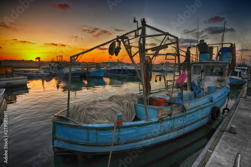 fishing boat at sunset