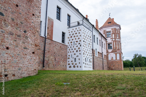 Fototapeta Naklejka Na Ścianę i Meble -  Photo of an ancient brick castle in nature in the summer.