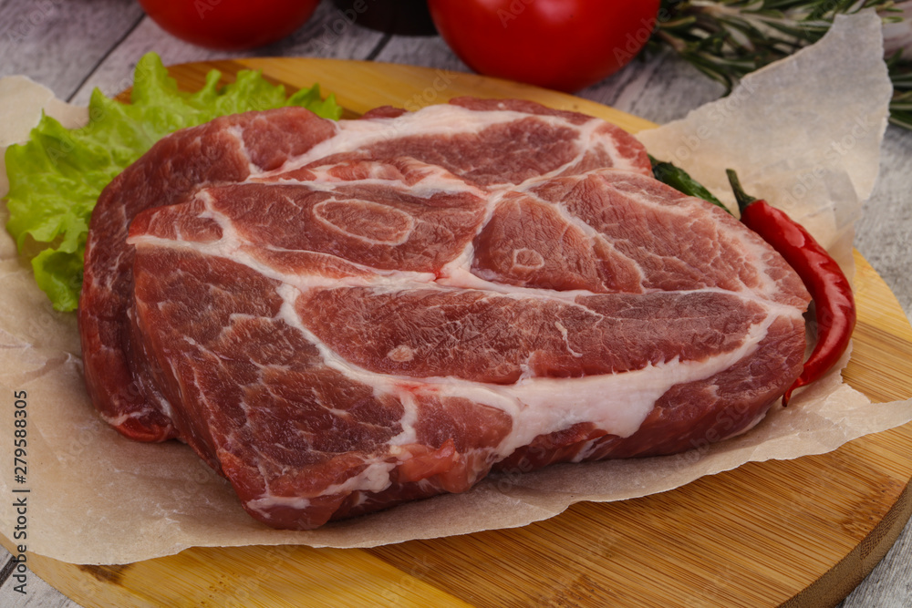 Raw pork neck steak