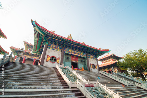 Red pgoda of chinese style temple in Bangkok photo