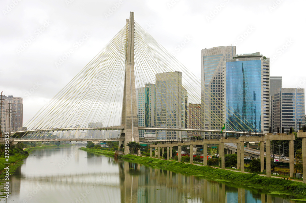 Sao Paulo city landmark Estaiada Bridge reflex in Pinheiros river, Sao Paulo, Brazil