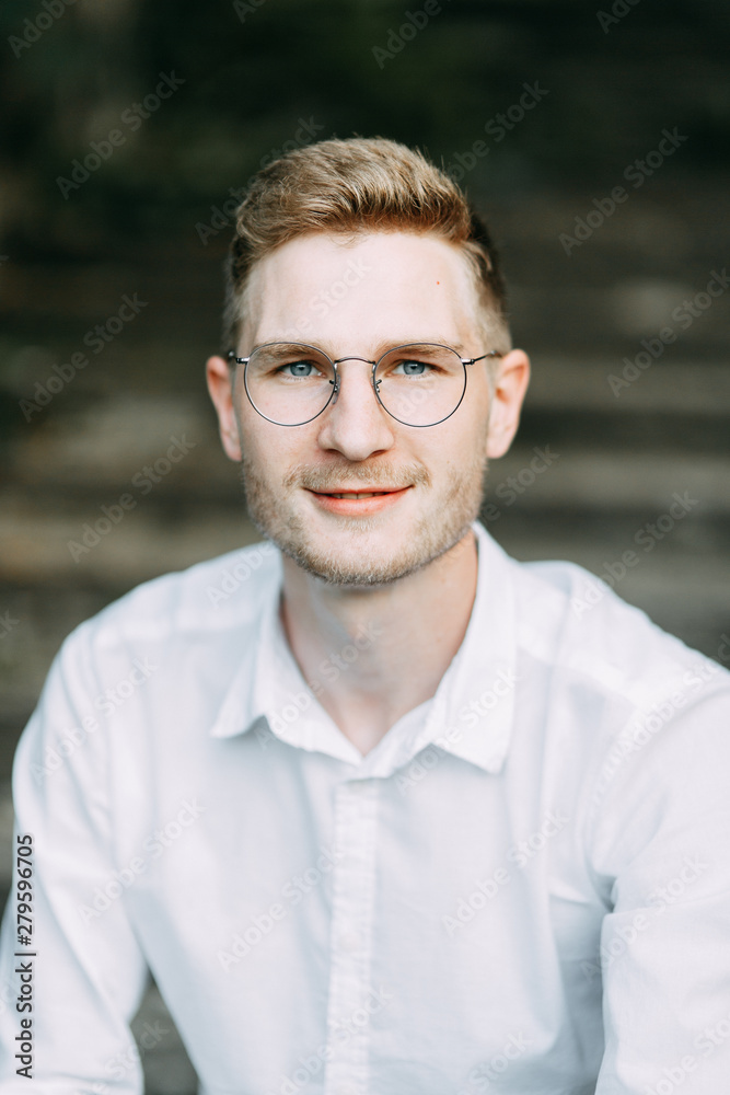 Fototapeta premium Portraits of the groom. A stylish wedding in the European style of fine art.