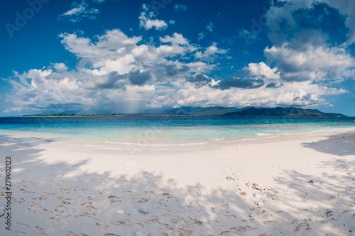 Paradise beach with blue ocean in tropical island
