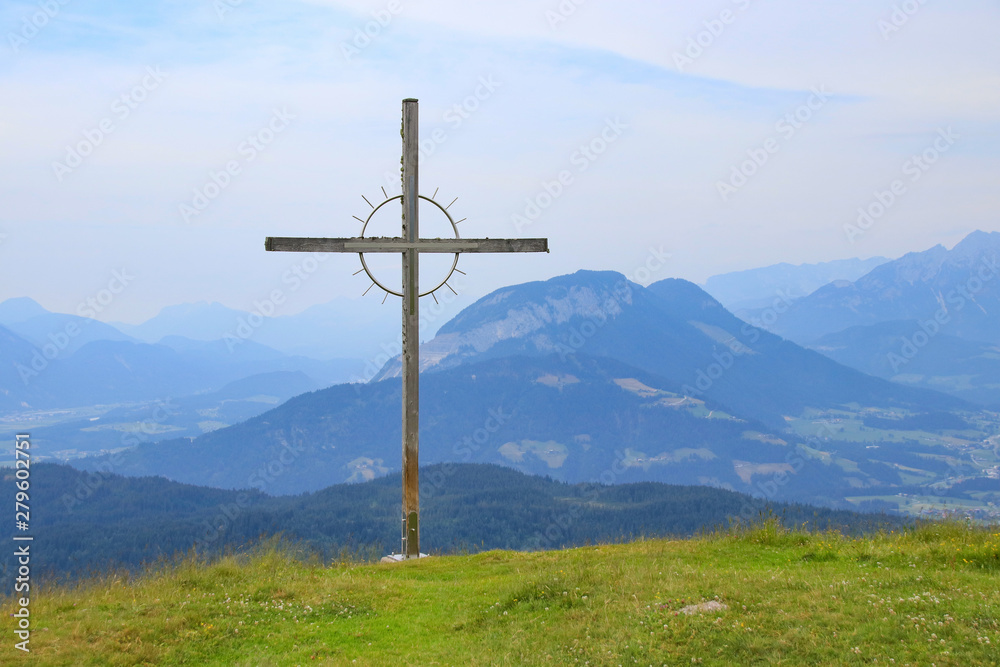 Holiday destination Wildschönau - Niederau, view from the mountain Markbachjoch with summit cross in summer, Tyrol - Austria