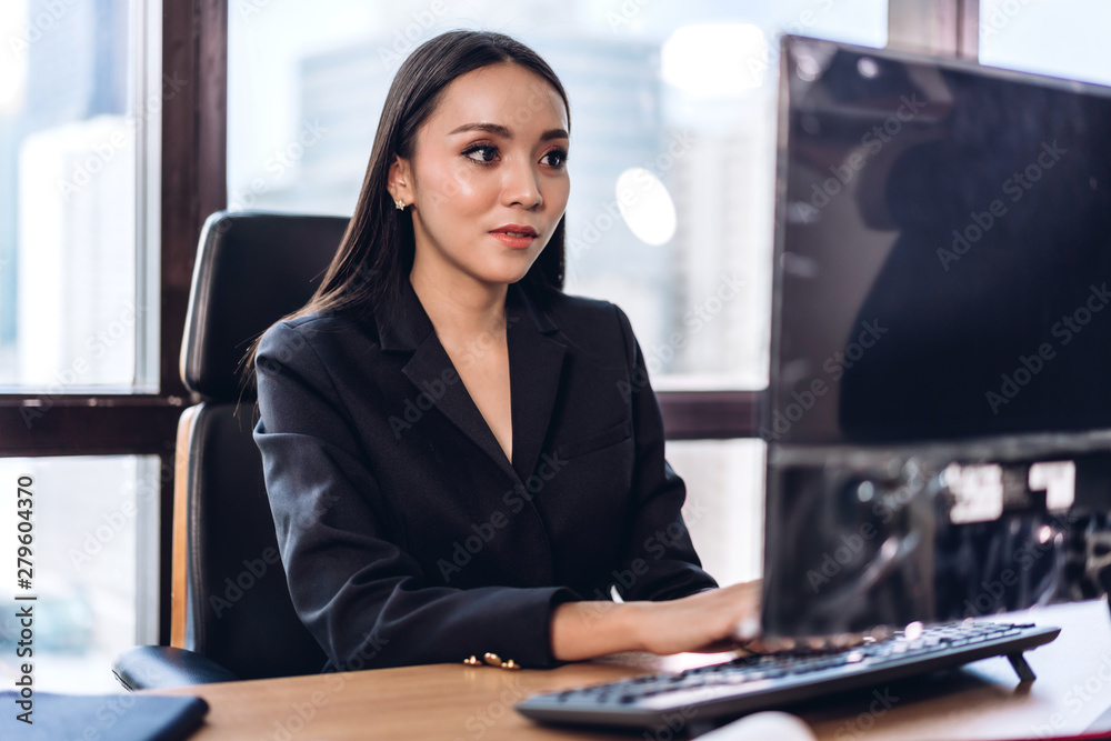 Businesswoman working with laptop computer.creative business people planning at modern work loft
