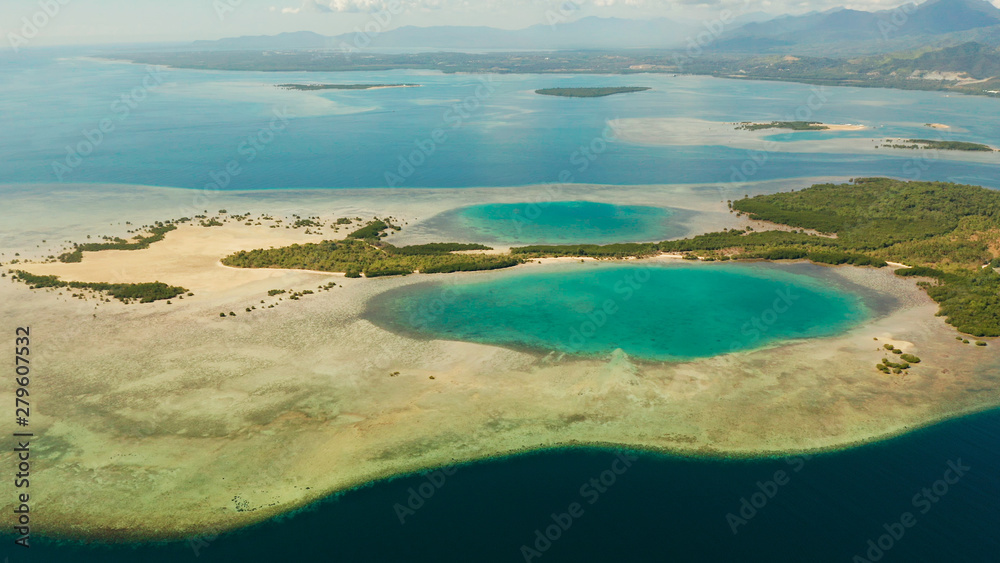 aerial view Honda bay with tropical islands and sandy beaches surrounded by coral reef with azure water. Summer and travel vacation concept, Puerto princesa, Palawan, Philippines.