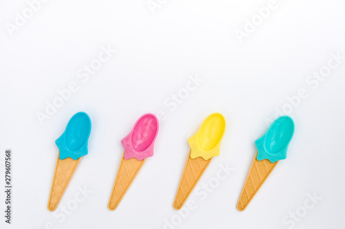 Summer bright ice cream spoons on white background © Lyubov Ilyushina