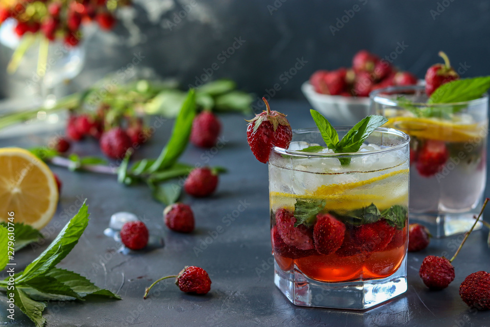 Cold strawberry mojito drink with strawberry, lemon slices and mint, horizontal photo Cold strawberry mojito drink with strawberry, lemon slices and mint, horizontal photo