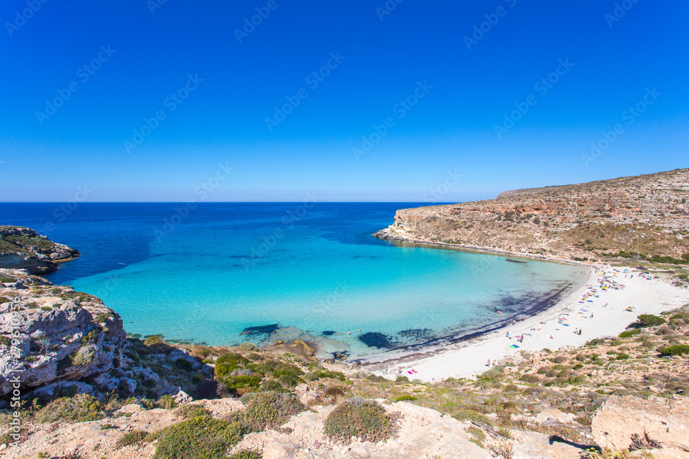 Lampedusa Island Sicily - Rabbit Beach and Rabbit Island  Lampedusa “Spiaggia dei Conigli” with turquoise water and white sand at paradise beach.