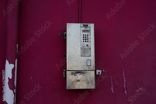 Abandoned or damaged public phone by vandalism 
