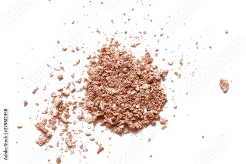 Crushed nude shimmer eye shadow texture isolated on white background. Face powder, bronzer swatch. Broken eye shadow smear. Cosmetic powder sample.