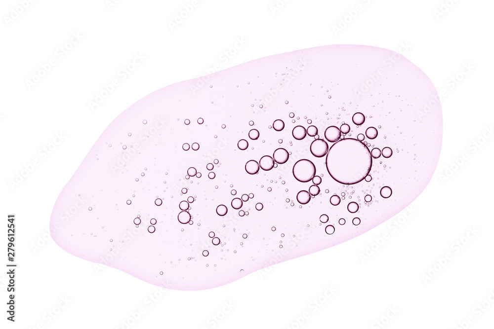 Fototapeta premium Face serum texture. Pink transparent liquid gel with bubbles smear isolated on white background.