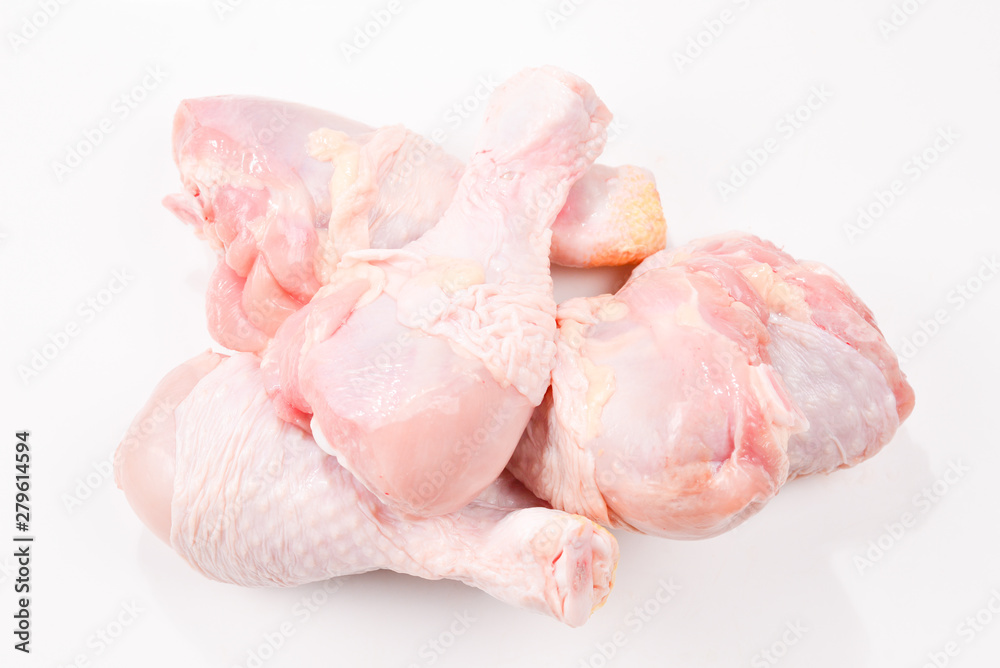 Tasty raw chicken legs. Top view. Isolated on white