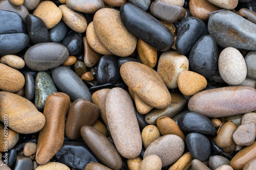 Natural background. Image of wet big sea pebbles