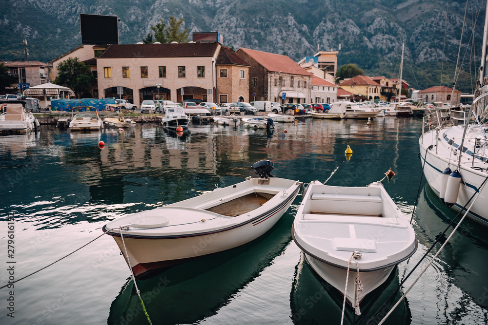 Two boats in harbor of Kotor