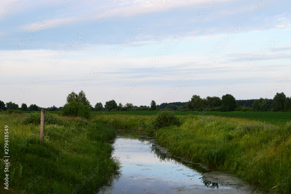 landscape with river and blue sky