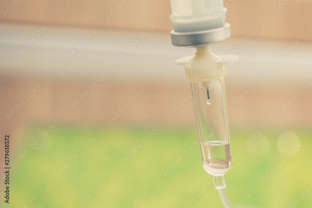Saline solution drip for treatment patient in the hospital.