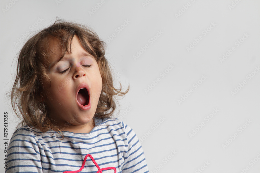 Portrait on white background of 3-4 years yawn girl Portrait on white background of 3-4 years yawn girl