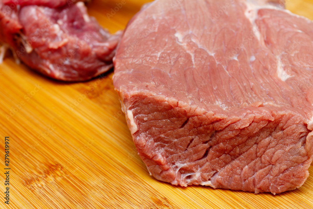 Cooking a delicious, juicy steak at home. Сutting beef meat Cooking a delicious, juicy steak at home. Сutting beef meat