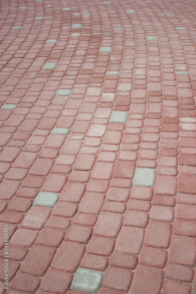Texture of red floor paving tiles in city - background Texture of red floor paving tiles in city - background