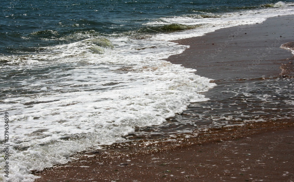 beautiful beach with clear water and waves beautiful beach with clear water and waves