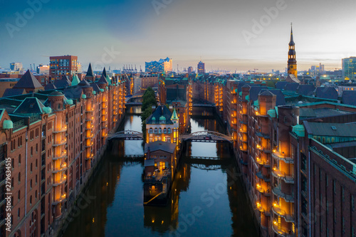 Hamburg Speicherstadt am Abend mit Blick auf das Wasserschloss photo