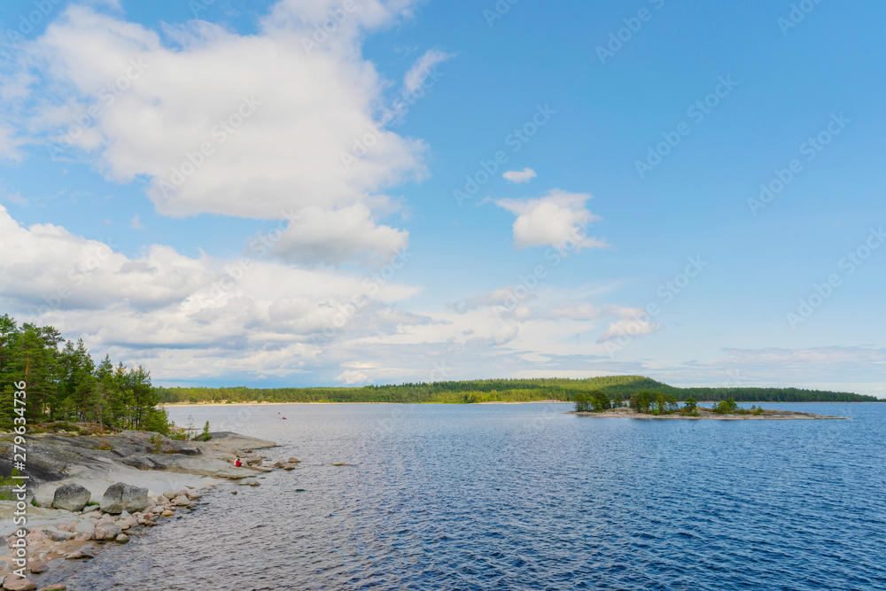 Islands in Lake Ladoga. Beautiful landscape - water, pines and boulders.