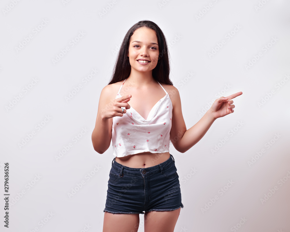 young girl isolated in front of a white background young girl isolated in front of a white background