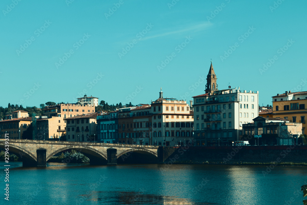 Florence, Italy - old European city. Quay, bridge, architecture. Summer day.