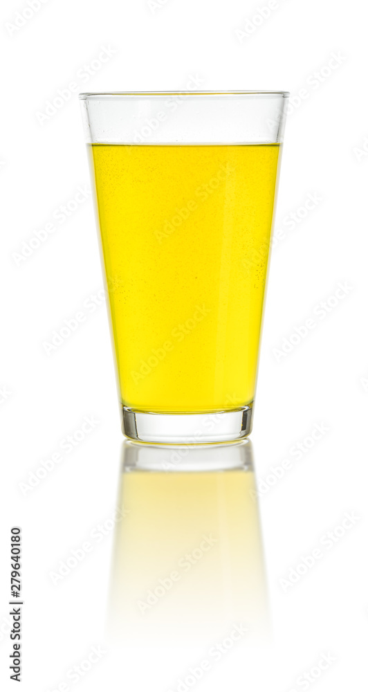 Glass filled with an orange soft drink Glass filled with an orange soft drink