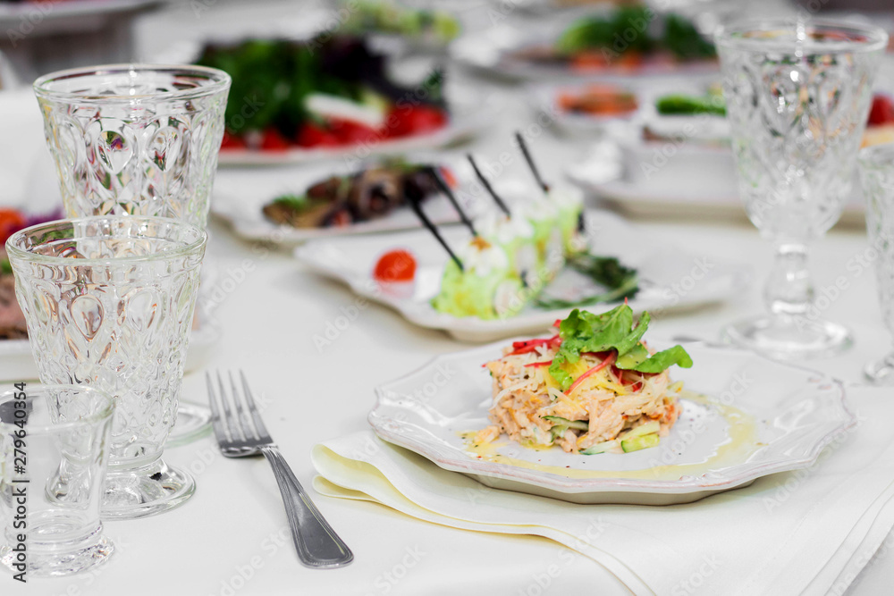 Delicious dishes on the table in the restaurant. Wedding, Banquet