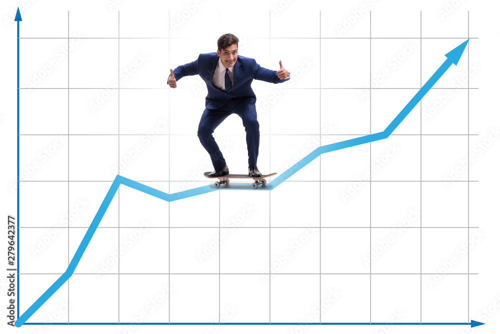 Businessman riding skateboard on financial graph Businessman riding skateboard on financial graph