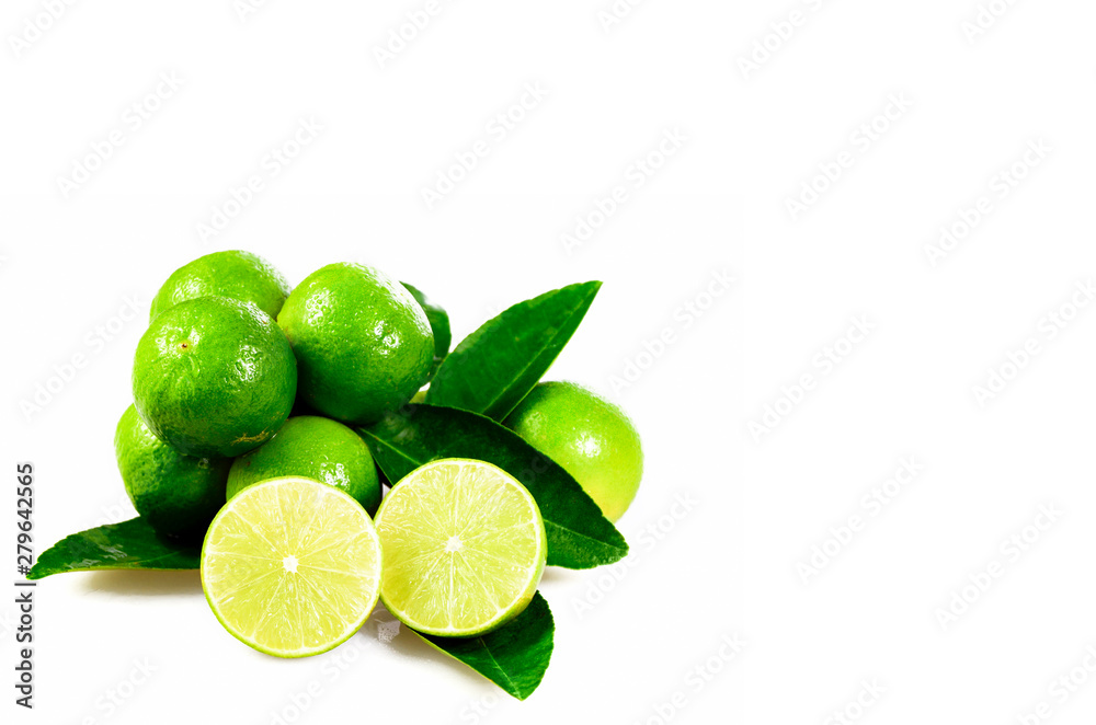 Seedless organic lime fruits (Citrus aurantifolia) isolated on white background.