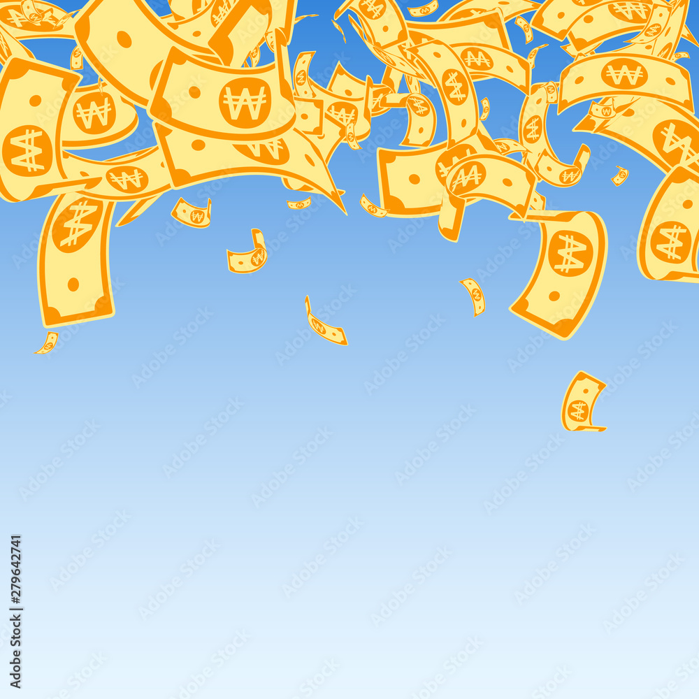 Fototapeta premium Korean won notes falling. Messy WON bills on blue 
