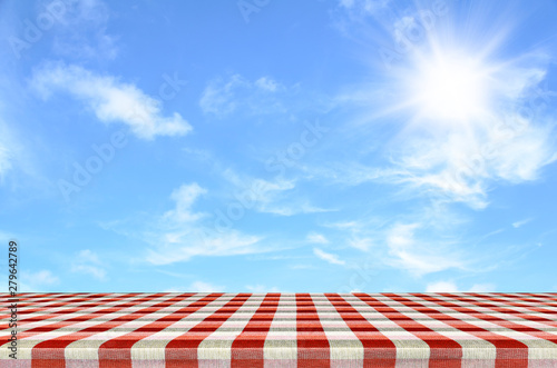 Outdoor picnic background in summer sun light.